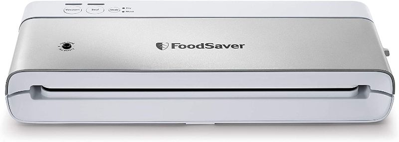 Photo 1 of FoodSaver Compact Vacuum Sealer Machine with Sealer Bags and Roll for Airtight Food Storage and Sous Vide, White
