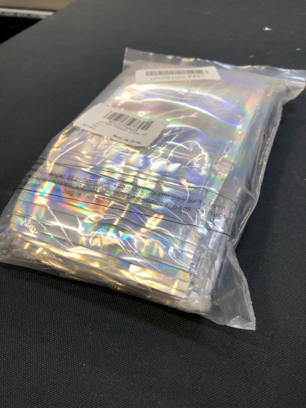 Photo 2 of 100 Pieces Smell Proof Bags Holographic Packaging Bags Storage Bag for Food Storage (Holographic Color,4 x 6 Inches)
