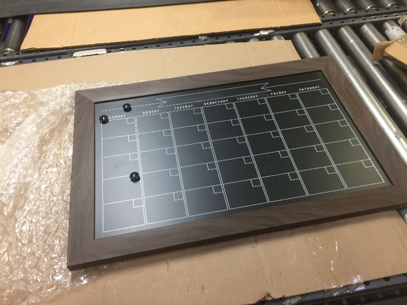 Photo 1 of 18"x27"  calendar and its magnetic 