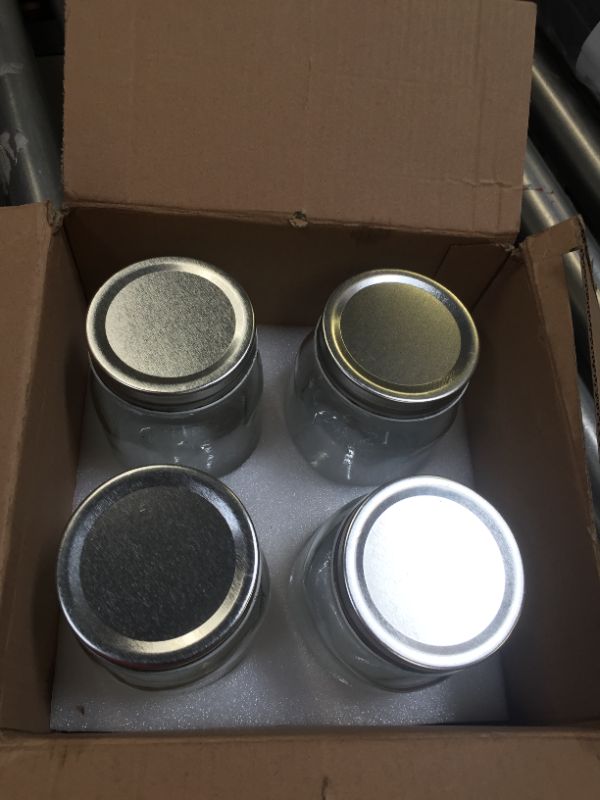 Photo 1 of 4 pak of jars 
