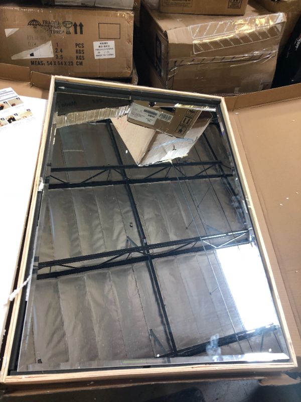 Photo 1 of 3'x2' mirror 