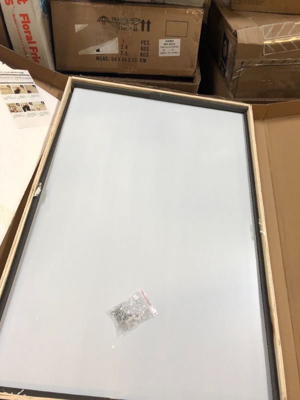 Photo 1 of 3'x2' mirror 
