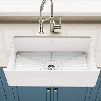 Photo 1 of 33-inch Ceramic Farmhouse Apron Reversible Single Bowl Kitchen Sink with Bottom Grid in, White Color
