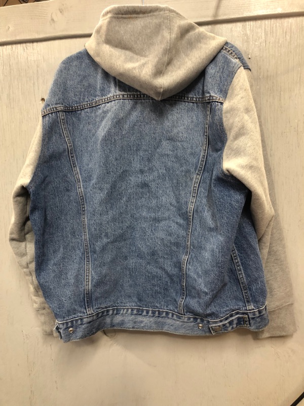 Photo 1 of MENS LEVI JEAN JACKET SIZE LARGE WITH HOODIE MINOR DIRTY MARKS SHOULD BE WASHED