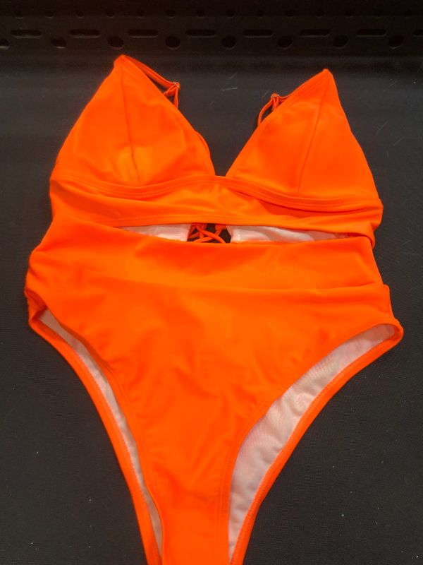 Photo 1 of SIZE LARGE NEON ORANGE TWO PIECE BATHING SUIT 