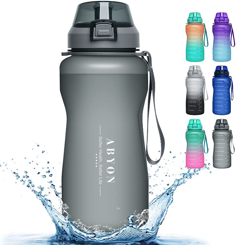 Photo 1 of ABYON Water Bottle with Removable Straw - Half Gallon / 64Oz Container with Hydration Measurements - Leak & Dust-Proof, Thick Bottom - Non-BPA, Tritan Plastic, Paracord Handle