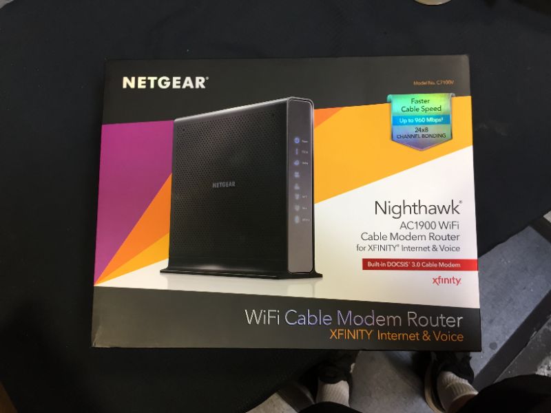 Photo 3 of NETGEAR Nighthawk AC1900 (24x8) DOCSIS 3.0 WiFi Cable Modem Router Combo For XFINITY Internet & Voice (C7100V) Ideal for Xfinity Internet and Voice services , Black

