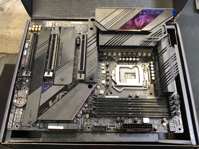 Photo 3 of ROG Strix Z590-E Gaming WiFi 6E LGA 1200(Intel® 11th/10th Gen) ATX Gaming Motherboard (PCIe 4.0, 14+2 Power Stages, DDR4 5333+, Dual Intel® 2.5 Gb LAN,Thunderbolt 4, 4xM.2/NVMe SSD and Aura RGB)---CPU PINS ARE BENT---
