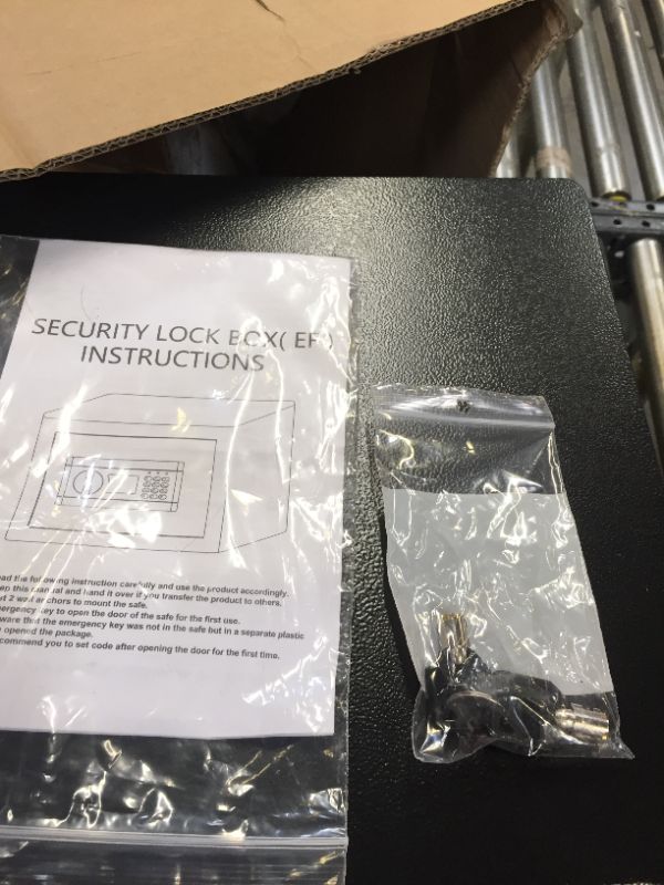 Photo 4 of 12 x 15 x 18 inch black safe with keys.