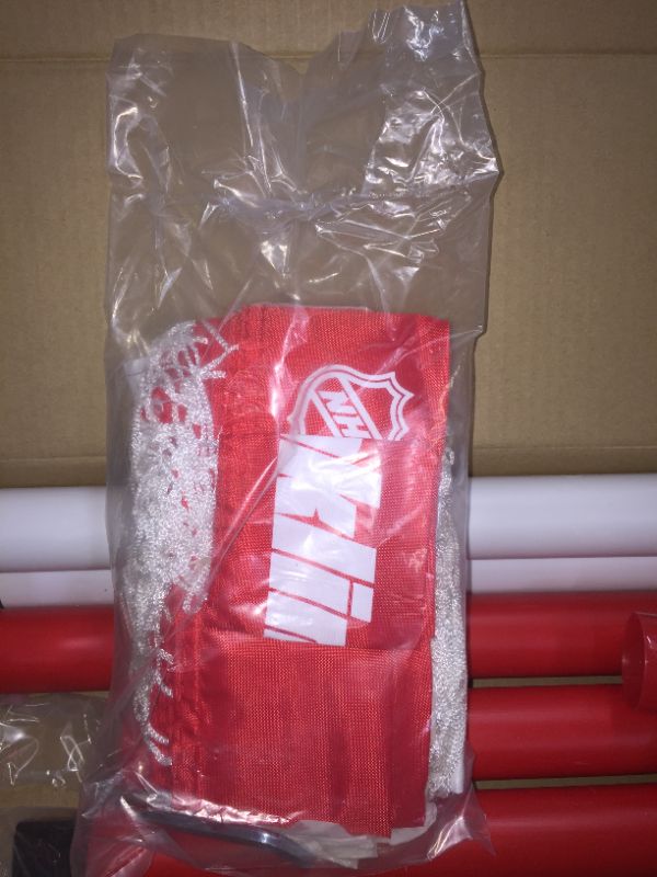 Photo 1 of Franklin Sports NHL Youth Street Hockey Set - (2) Kids Junior Hockey Sticks, PVC Goal + Roller Hockey Ball Included - Indoor + Outdoor Net - 46"