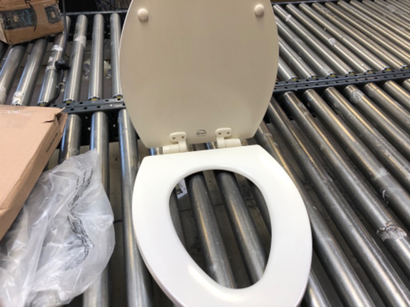 Photo 3 of BEMIS 1600E4 346 Ashland Toilet Seat with Slow Close, Never Loosens and Provide the Perfect Fit, ELONGATED, Enameled Wood, Biscuit/Linen
