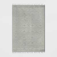 Photo 1 of Diamond Outdoor Rug with Fringe - 7 X 10, WARPED/DIRTY 

