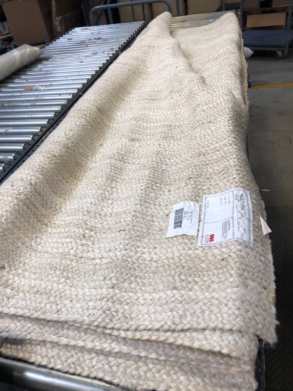 Photo 2 of Off White Jute Braided 8' x 10' Area Rug
DIRTY.