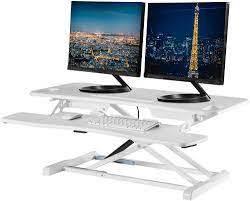 Photo 1 of TechOrbits Standing Desk Converter - Particle Board, Adjustable Height Sit to Stand Up Desk Riser for Home Office - Computer, Laptop & Dual Monitor Workstation & Machine Stand - 36 Inch, White
