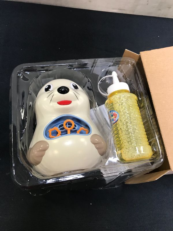 Photo 1 of  WHITE SEA LION BUBBLE MACHINE TOY 