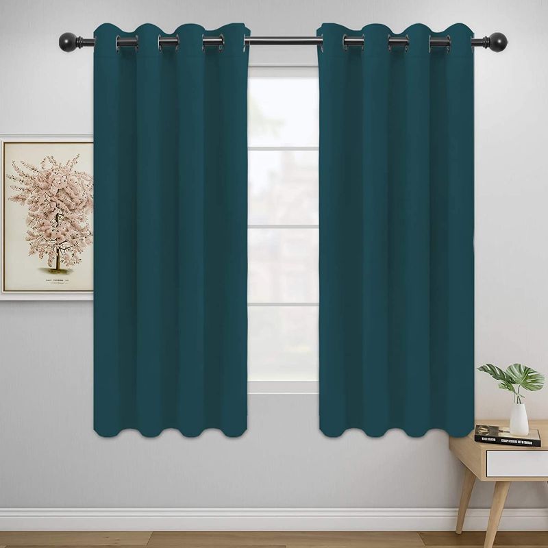 Photo 1 of Easy-Going Blackout Curtains for Bedroom, Solid Thermal Insulated Grommet and Noise Reduction Window Drapes, Room Darkening Curtains for Living Room, 2 Panels(52x63 in,Peacock Blue)
