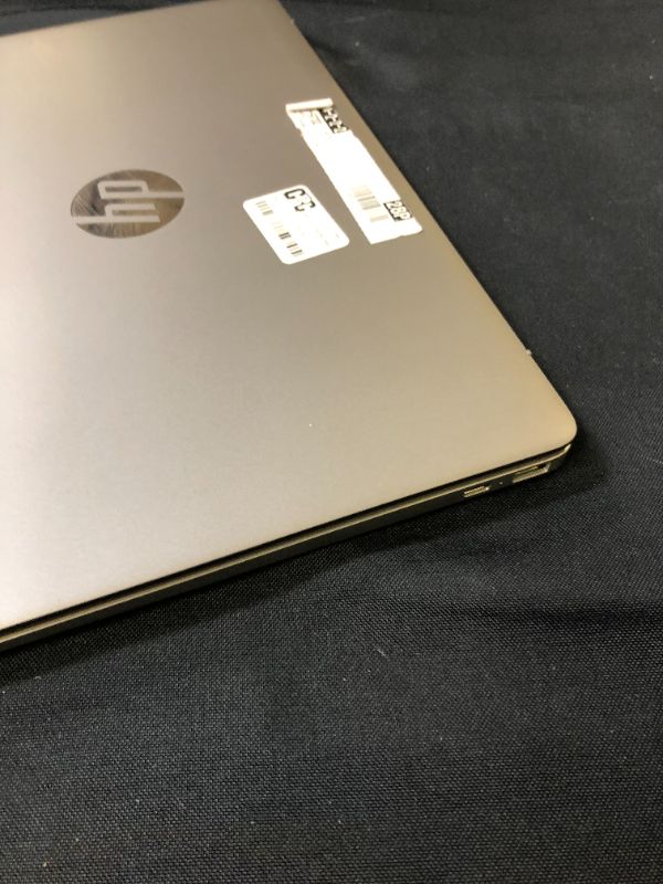 Photo 7 of LAPTOP ONLY - HP 14" Touchscreen Chromebook Laptop with Chrome OS - Intel Processor - 4GB RAM Memory - 64GB Flash Storage - Mineral Silver (14a-na0037nr) - MISSING INSTRUCTIONS / CHARGER / ORIGINAL BOX - SCRATCH ON SCREEN - SCRATCHES AROUND ITEM FROM NOT 