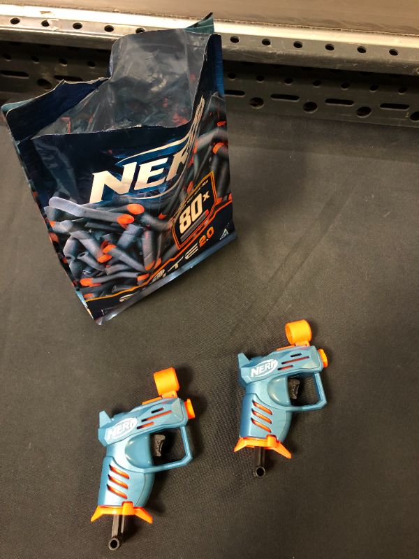 Photo 2 of NERF ELITE 2.0 WITH 2 MINI GUNS, BARBIE COLOR REVEAL, AND BUSY BOLTS 3 COUNT BAGLOT 