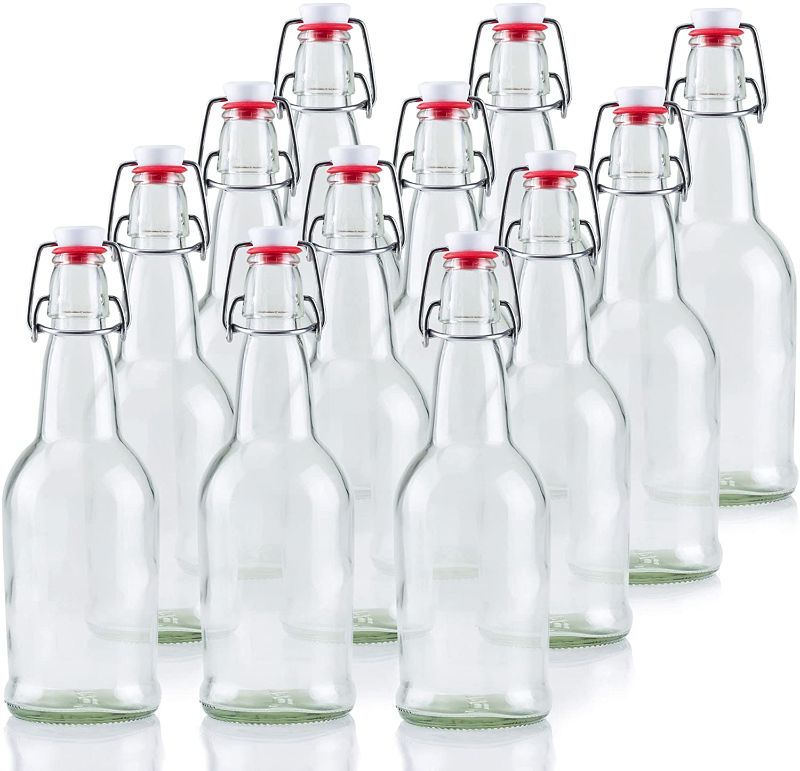 Photo 1 of Crutello 16 Ounce Clear Glass Flip Top Beer Bottles for Brewing - Beer, Kombucha, Soda, Juice - 12 Pack Glass Bottle for Fermentation, Storage, Drinking
