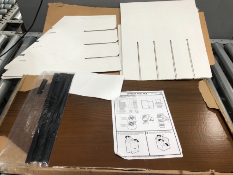 Photo 2 of 
Safco Products 3079 Vertical Roll File, 12 Compartment, Walnut
12 COMPARTMENTS - 12 square tube openings, reinforced with plastic molding, allow for snug and secure organization of roll files. Each compartment fits roll diameters up to 3 7/8".