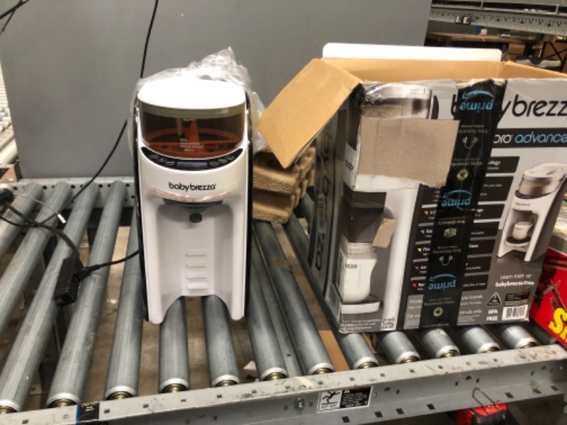 Photo 1 of New and Improved Baby Brezza Formula Pro Advanced Formula Dispenser Machine - Automatically Mix a Warm Formula Bottle Instantly - Easily Make Bottle with Automatic Powder Blending
