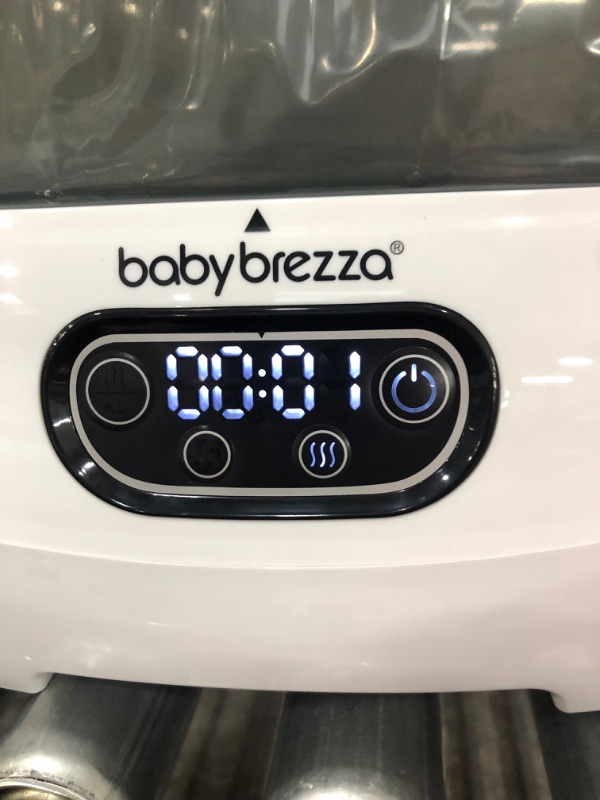 Photo 4 of Baby Brezza Baby Bottle Sterilizer and Dryer Advanced – Electric Steam Sterilization Machine – Universal Sterilizing for All Bottles: Plastic + Glass + Pacifiers + Breast Pump Parts - HEPA Filtration -TESTED AND FUNCTIONS-
