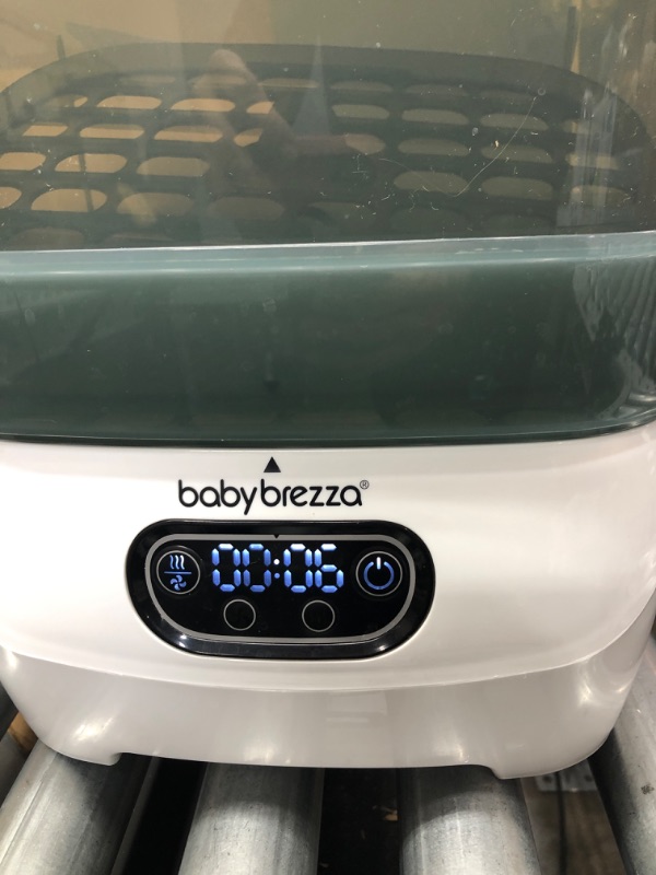 Photo 3 of Baby Brezza Baby Bottle Sterilizer and Dryer Advanced – Electric Steam Sterilization Machine – Universal Sterilizing for All Bottles: Plastic + Glass + Pacifiers + Breast Pump Parts - HEPA Filtration
