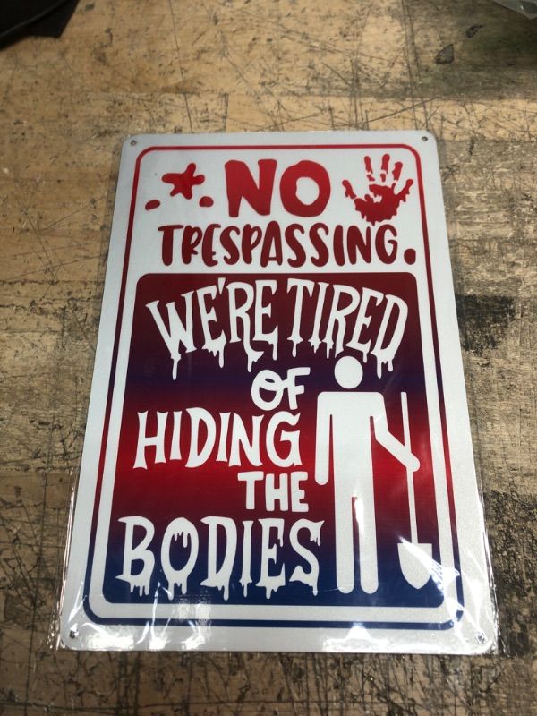 Photo 2 of No Trespassing Signs We're Tired of Hiding the Bodies Metal Sign Rust Free Aluminum 12x8 Inch Funny Metal Sign for Halloween Decoration, Indoor/Outdoor Use, Reflective, UV Protected & Waterproof Halloween No Trespassing Sign 12x8 inch