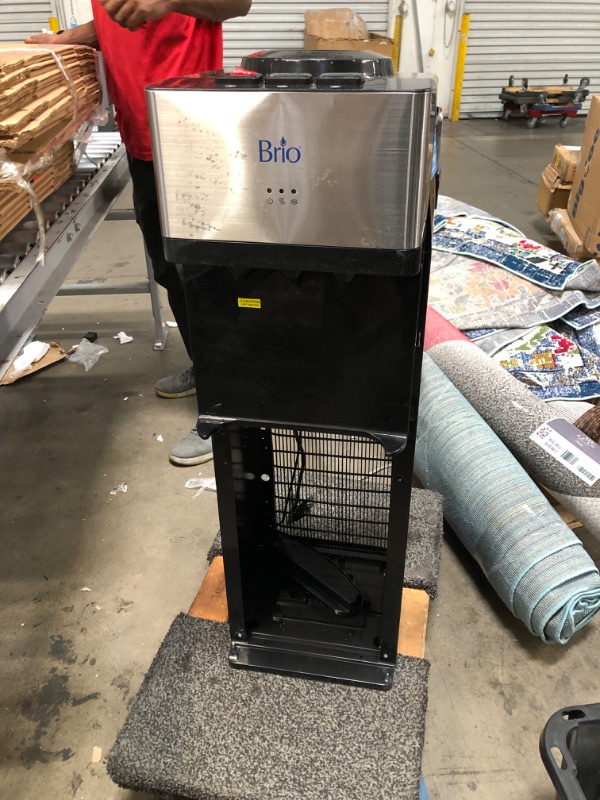 Photo 8 of (DAMAGED)Brio Limited Edition Top Loading Water Cooler Dispenser - Hot & Cold Water, Child Safety Lock, Holds 3 or 5 Gallon Bottles - UL/Energy Star Approved
**CRACKS, BOTTOM DOOR CAME OFF**
