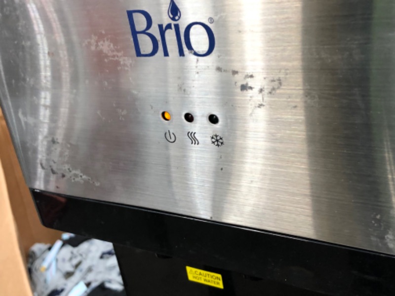 Photo 3 of (DAMAGED)Brio Limited Edition Top Loading Water Cooler Dispenser - Hot & Cold Water, Child Safety Lock, Holds 3 or 5 Gallon Bottles - UL/Energy Star Approved
**CRACKS, BOTTOM DOOR CAME OFF**
