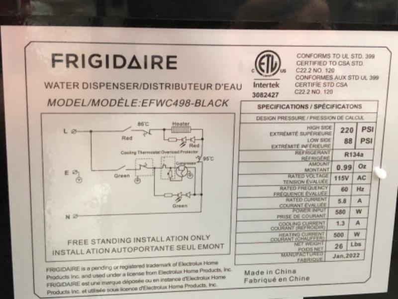 Photo 6 of (DAMAGE)Frigidaire Enclosed Hot and Cold Water Cooler/Dispenser (Black)
**MAKES LOUD NOISE, TURNS ON, LEAKS WATER**