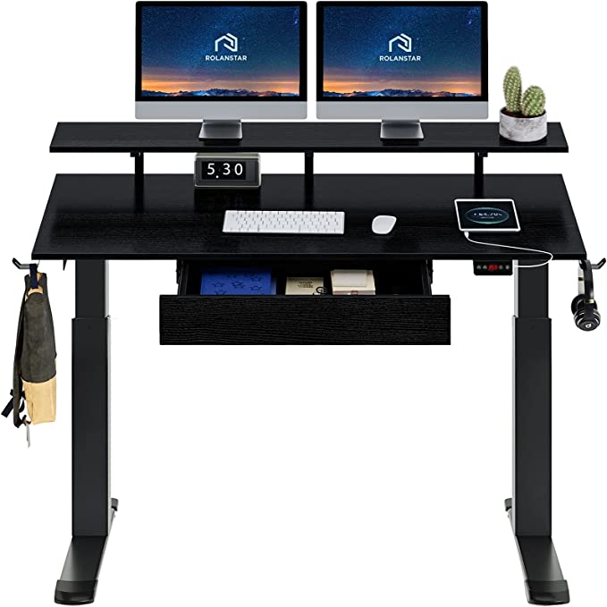 Photo 1 of Rolanstar Standing Desk Dual Motor with USB Charging Ports, 55" Adjustable Height Desk with Drawer and Monitor Shelf, Electric Standing Desk with Double Headphone Hook, Black…
