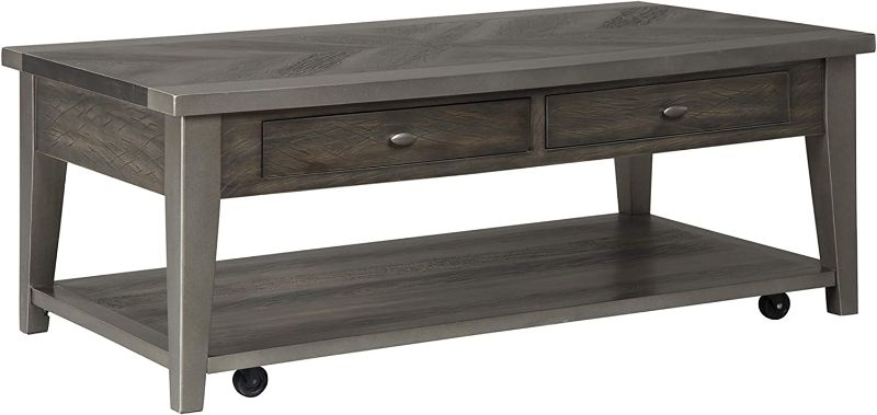 Photo 1 of ***DENTED CORNER*** Signature Design by Ashley Branbury Urban Rectangular Coffee Table with 2 Drawers, Fixed Base Shelf and Casters For Mobility, Dark Gray with Aged Metallic Finish
