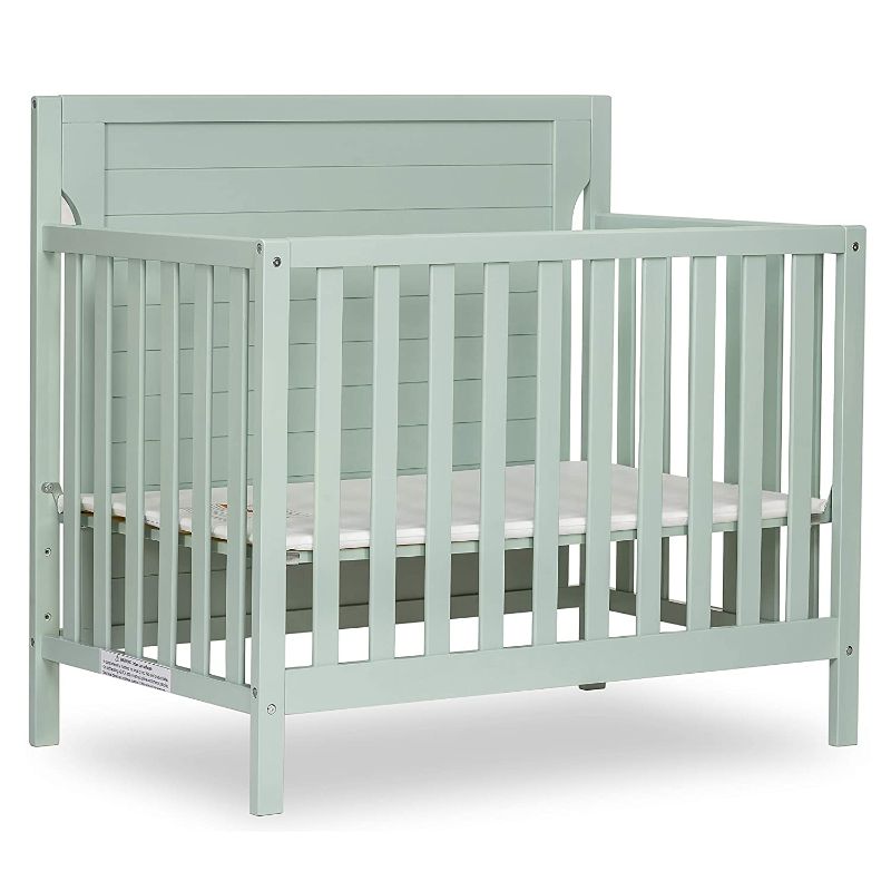 Photo 1 of Dream On Me Bellport 4 in 1 Convertible Mini/Portable Crib in Light Seafoam Green, Non-Toxic Finish, Made of Sustainable New Zealand Pinewood, with 3 Mattress Height Settings
