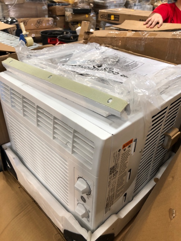 Photo 4 of ***PARTS ONLY*** GE® 5,000 BTU 115-Volt Electronic Window Air Conditioner with Remote and Eco Mode, White, AHW05LZ
