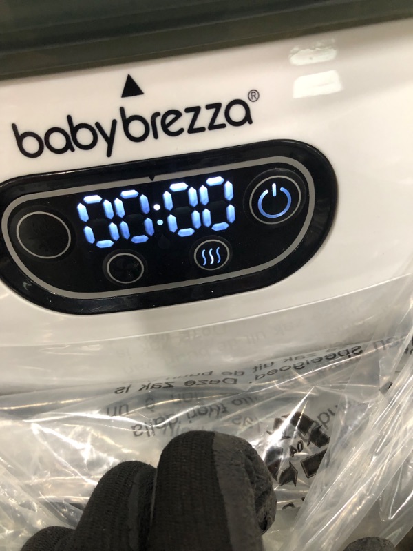 Photo 3 of Baby Brezza Baby Bottle Sterilizer and Dryer Advanced – Electric Steam Sterilization Machine – Universal Sterilizing for All Bottles: Plastic + Glass + Pacifiers + Breast Pump Parts - HEPA Filtration

