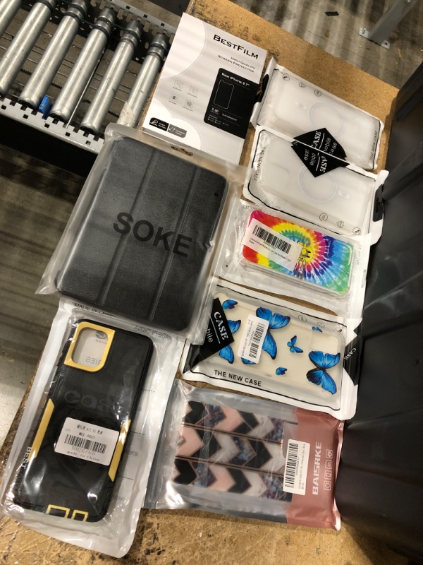 Photo 1 of **BUNDLE OF 8**
Bundle of misc phone cases and accessories.