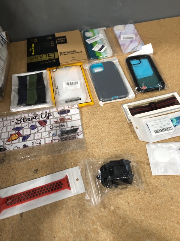 Photo 1 of 14 Pack Assorted iPhone Cases/Screen Protectors, Watch Bands, AirPod/Tag Cases ( 1st Gen) 
and KEYBOARD cover 