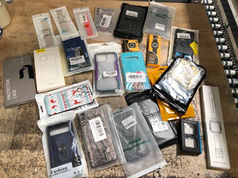 Photo 1 of bundle of 23 items. phones cases & watch bands. 
phone cases have different sizes. 