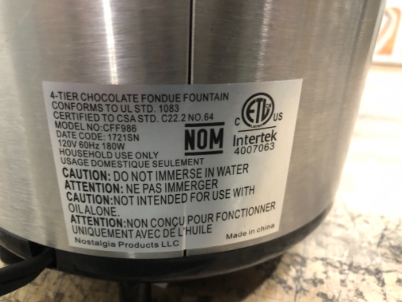 Photo 3 of ***PARTS ONLY*** Nostalgia NCFF986SS 4-Tier 2-Pound Chocolate Fondue Fountain - 2 Pound - Stainless Steel