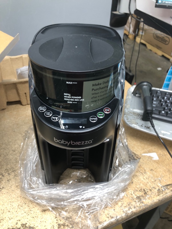 Photo 2 of  Baby Brezza Formula Pro Advanced Formula Dispenser Machine - Automatically Mix a Warm Formula Bottle Instantly - Easily Make Bottle with Automatic Powder Blending (BLACK)