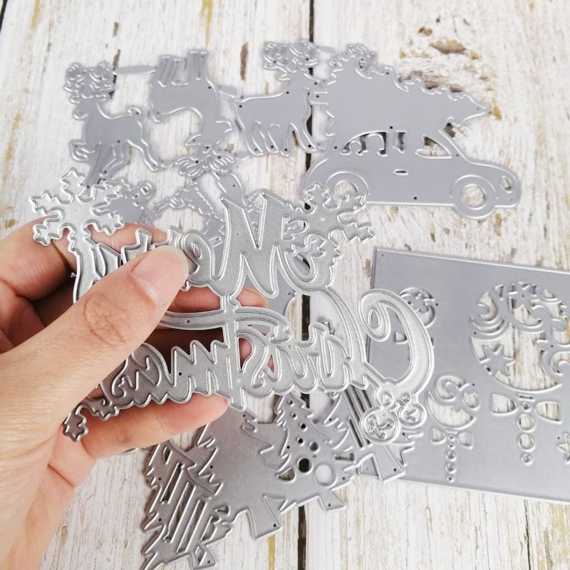 Photo 1 of 2- 9 Pieces Christmas Metal Die Cut Assorted Silver Cutting Die Decorative Cut Stencil Christmas Tree Die Christmas Die Crafting Die Cut for Card Making DIY Craft Scrapbook Embossing Embellishment
