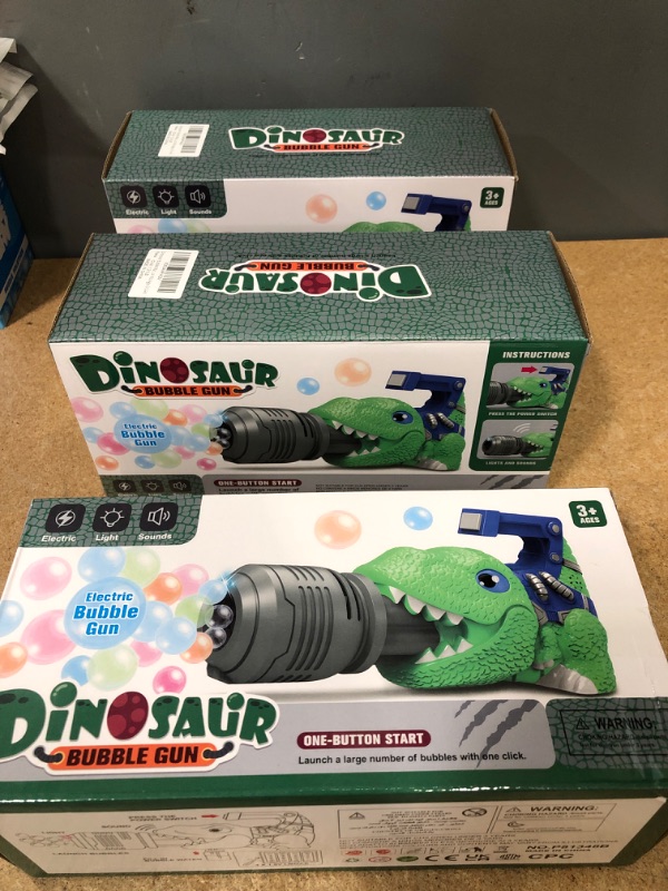 Photo 2 of (X3) Dinosaur Bubble Machine Bubble Gun Gifts for Boys Girls Bubble Toys for Kids Toddlers Bubble Blower with Music Green Bubble Maker Summer Birthday Gifts for Kids Ages 3-5,4-8
