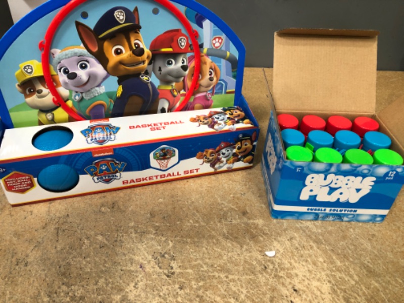 Photo 1 of BUNDLE OF 12PACK OF BUBBLES & PAW PATROL MINI BASKET BALL HOOP