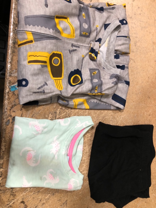 Photo 1 of BUNDLE OF LITLE KIDS CLOTHING: (4T) BOYS PJ, (M) GIRLS SHORTS-BLACK, (12M) GIRLS SHIRT