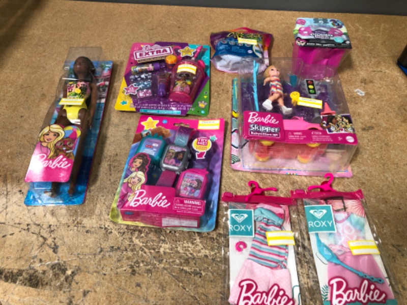 Photo 1 of BUNDLE OF: LITTLE GIRLS BARBIE ACCESSORIE DOLLS, BARBIE SKIPPER SET, DISNEY DOORABLE, BARBIE COLOR REVEAL, BARBIE WATCH TOY, BAREBIE LIP GLOSS SET, (X2) BARBIE CLOTHING, BARBIE DOLL