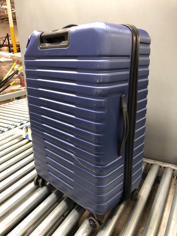 Photo 3 of DENTED ON TOP CORNER**
U.S. Traveler Boren Polycarbonate Hardside Rugged Travel Suitcase Luggage with 8 Spinner Wheels, Aluminum Handle, Navy, Checked-Medium 26-Inch
