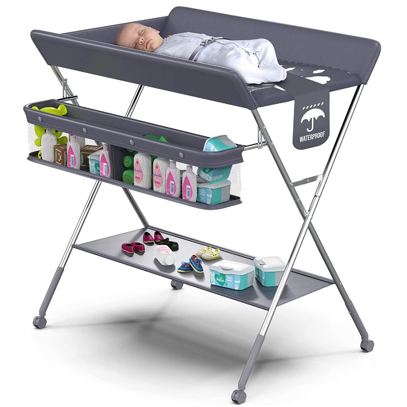 Photo 1 of Babylicious Baby Portable Changing Table - Foldable Changing Table with Wheels - Portable Diaper Changing Station - Adjustable Height Baby Changing Table-Safety Belt and Large Storage Rack for Infants

