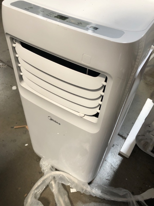 Photo 7 of Midea 8,000 BTU ASHRAE (5,300 BTU SACC) Portable Air Conditioner, Cools up to 175 Sq. Ft., Works as Dehumidifier & Fan, Remote Control & Window Kit Included
