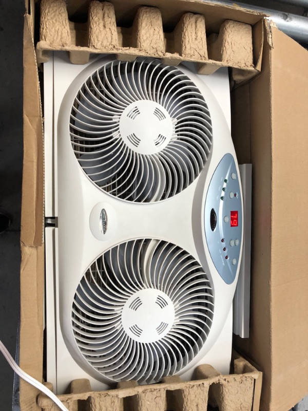 Photo 1 of Bionaire Window Fan with Twin 8.5-Inch Reversible Airflow Blades